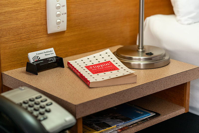 Bedside table with book